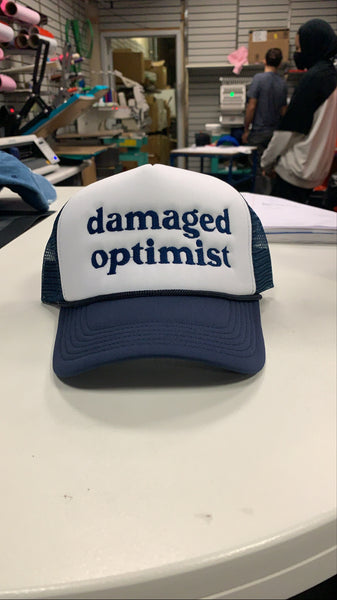 Damaged Optimist Trucker