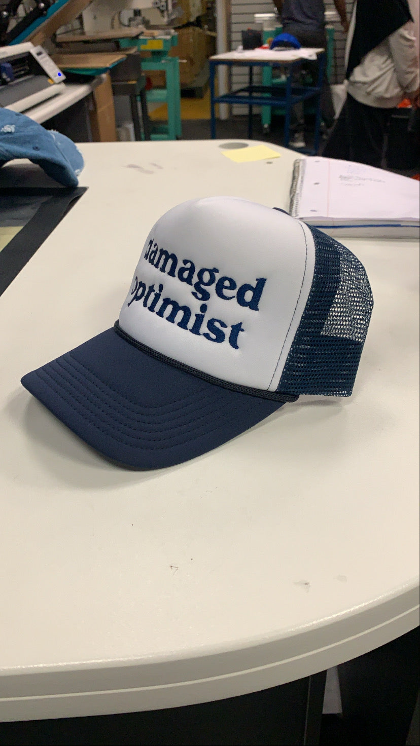 Damaged Optimist Trucker